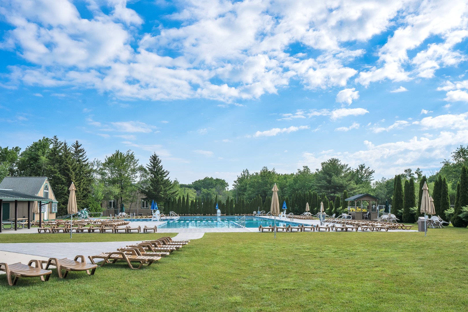Lounge poolside or enjoy a cool, refreshing swim under the open blue sky at the community pool.