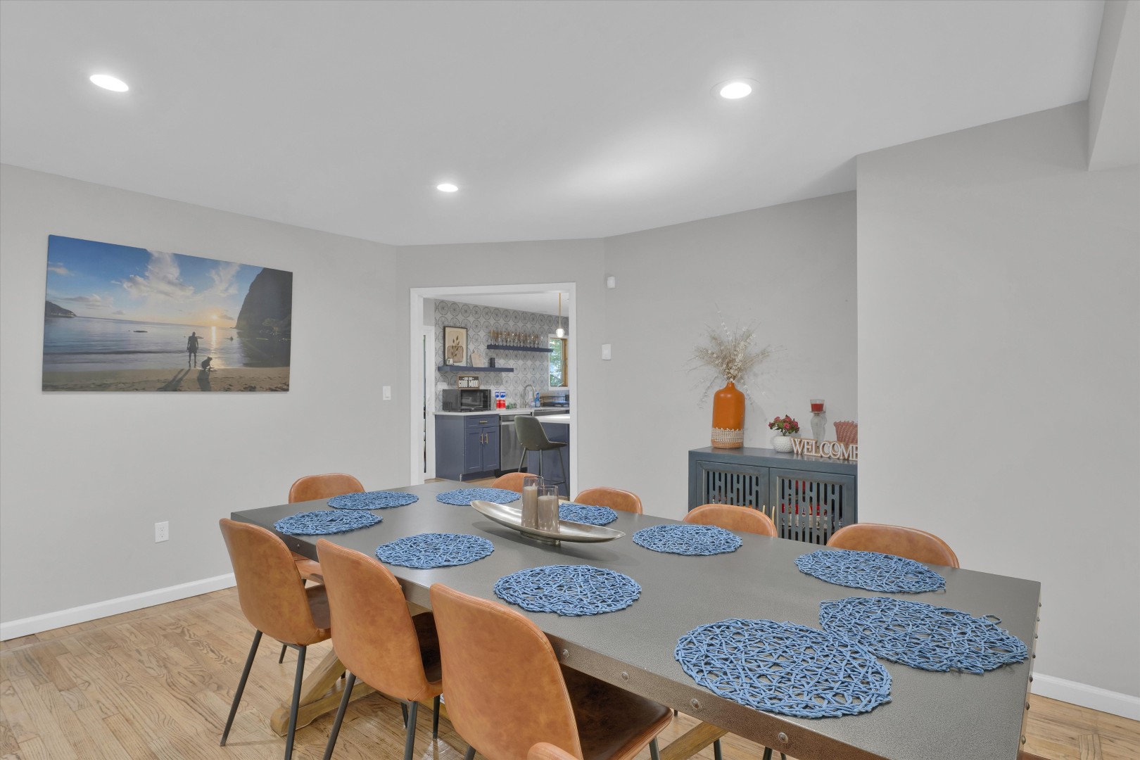 Enjoy shared meals and lively conversation at this spacious dining table, perfectly situated right between the kitchen and living area.