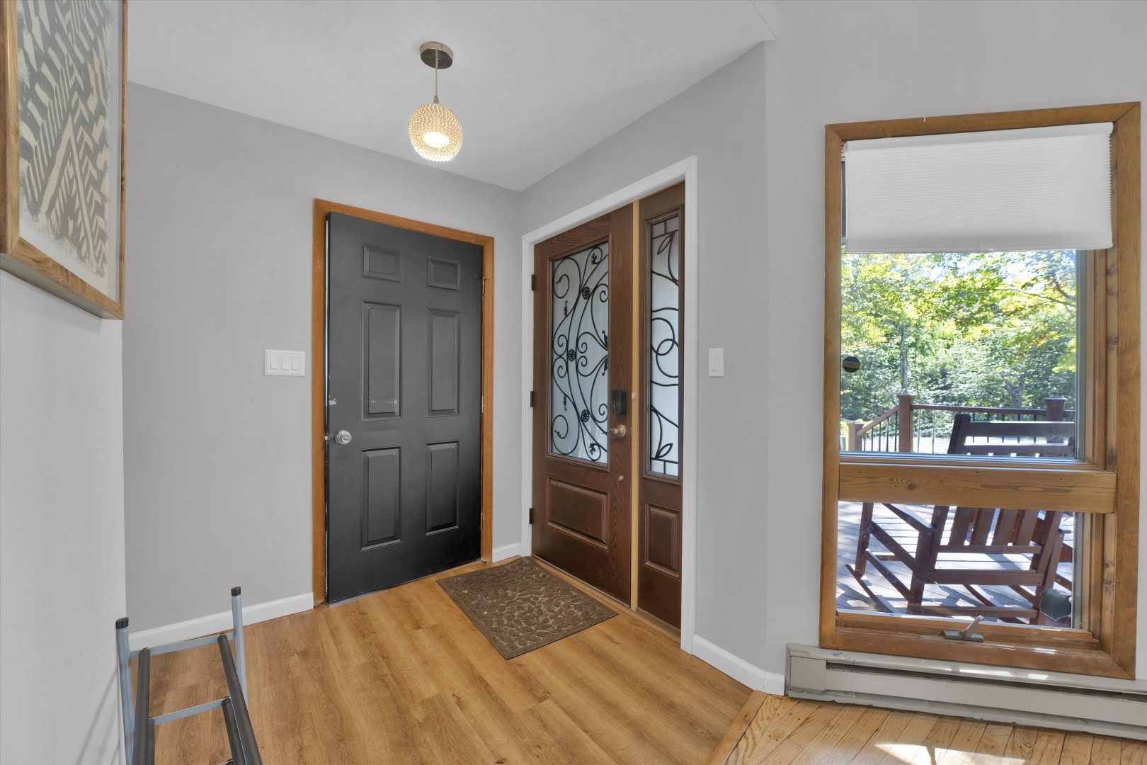 A warm Poconos welcome—step through the leaded-glass front doors into your private retreat.