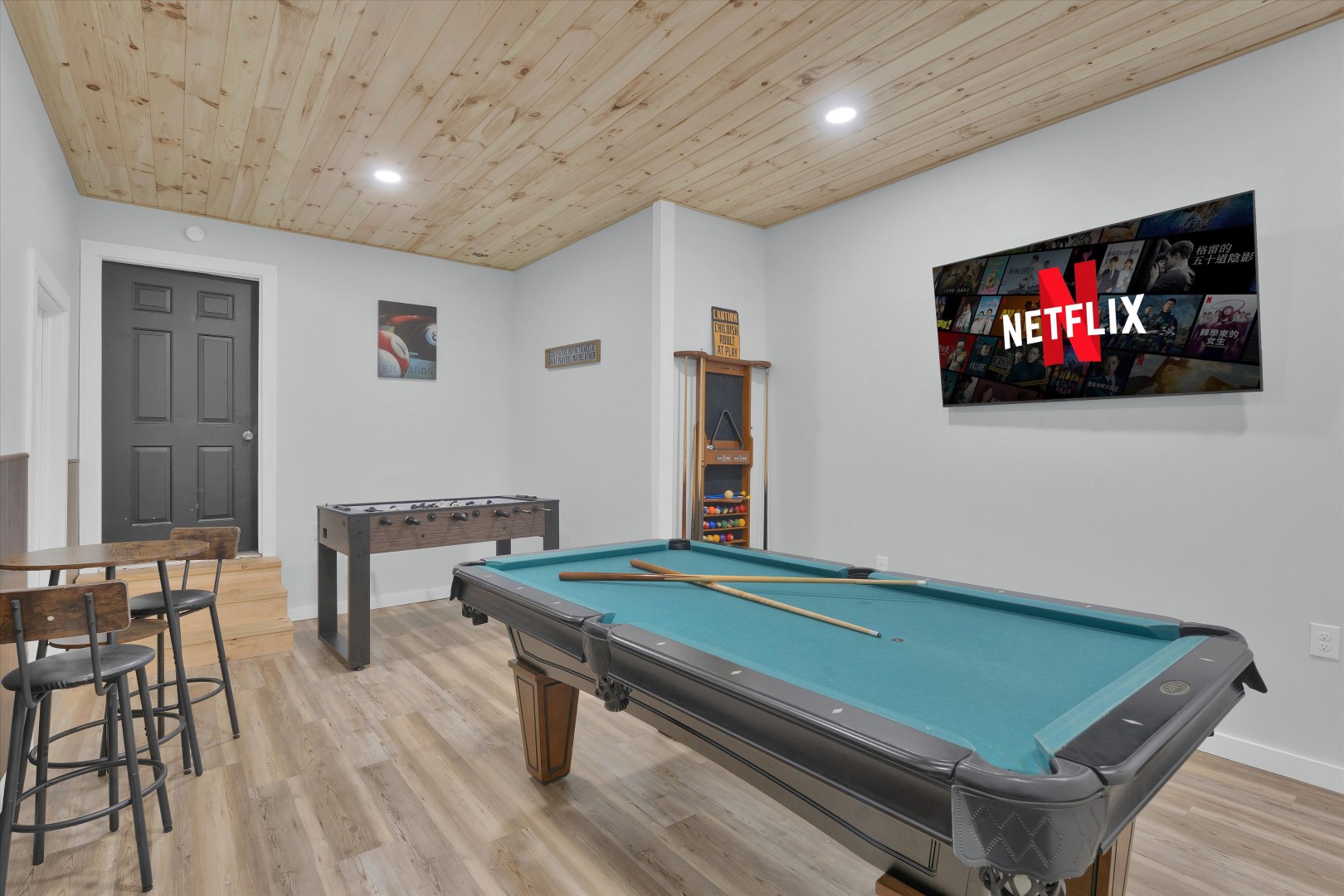 Game night headquarters: enjoy pool, foosball, and streaming favorites all in one open space.